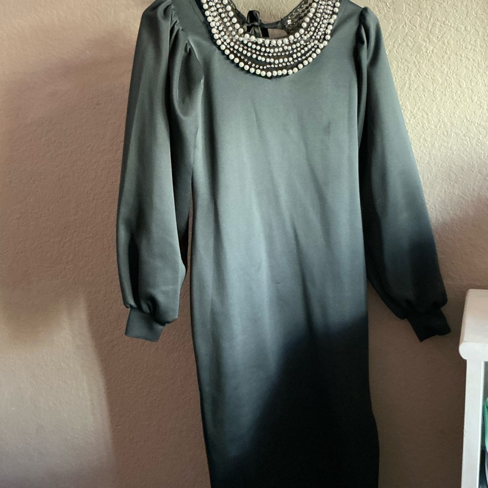 Elegant Black Dress with Pearl Embellishments